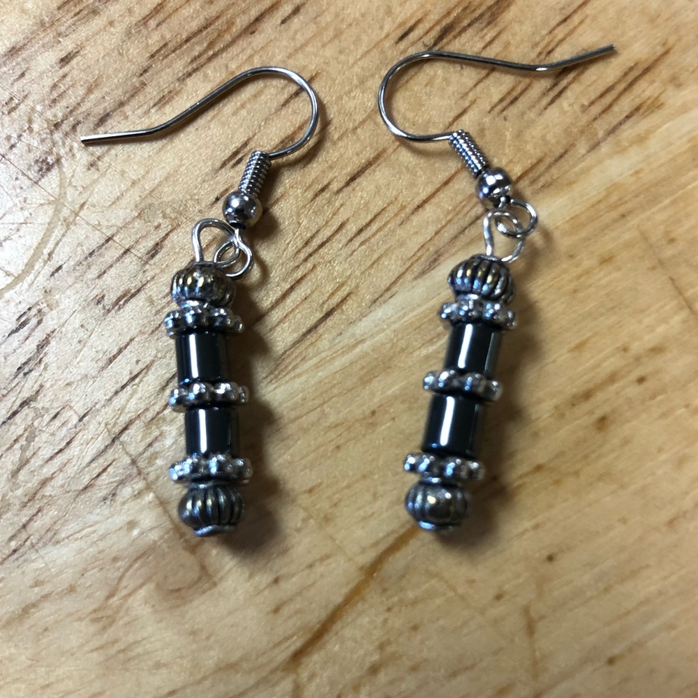 Necklace, two pairs of earrings and one bracelet